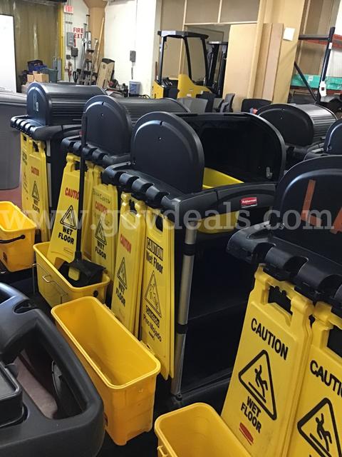 Lot of 4 Rubbermaid Janitorial Housekeeping Carts with wet floor signs