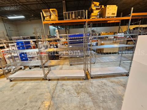 Lot of 4- Metal Racks On Wheels -  73" H  X  60" W