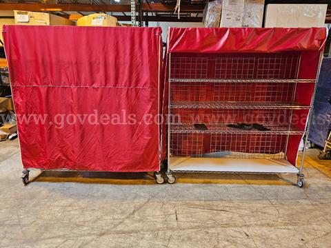 Lot of 2 - Metal Racks On Wheels W/ Red Covers - 6 Ft. Wide  X  6 Ft. Tall