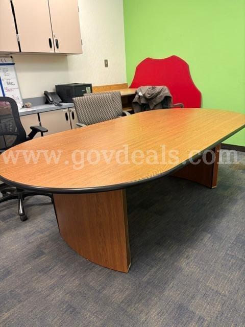 Large Oval Conference Table – Wood Grain Finish with Black Edge Trim