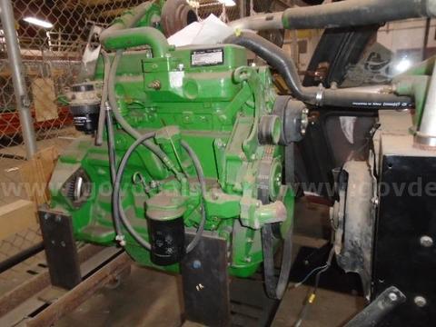 Lot of (1) John Deere 4 Cylinder Engine on Stand.