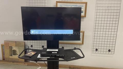 Conferencing Monitor & Magnavox DVD Player  - Monitor & DVD player power on , connection untested .