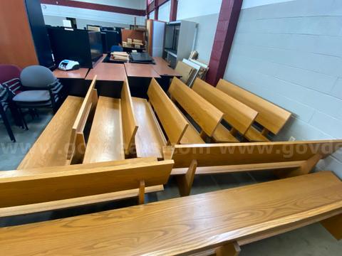 Numerous large hardwood benches