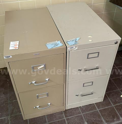 A lot of two (2) Metal Vertical File Cabinets, 2 drawers, beige and tan
