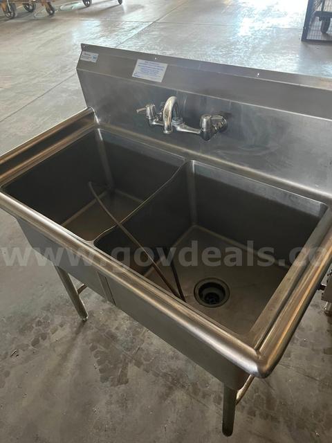 Deep Two basin Stainless sink and Delfield Stainless Shelving Cabinet