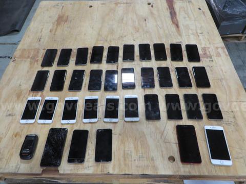 36 Cell phones total. (35) I-Phones, (1) Motorola Barrage