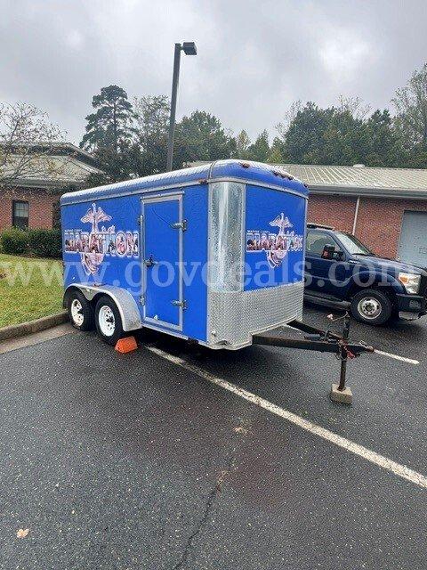 2005 7x12 J & L's Cargo Express, Inc Enclosed Trailer with Finish Line Arch