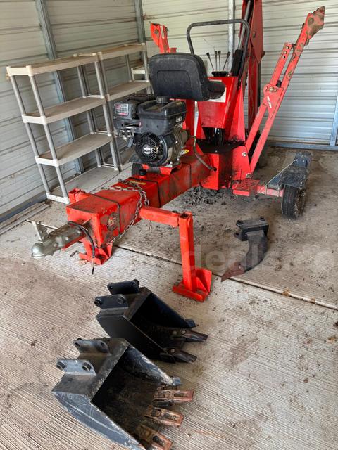 DR towable backhoe with 4 buckets
