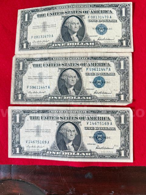 3 $1 Silver Certificates Top one is Miscut