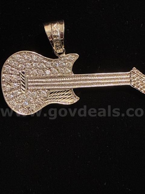 Radiant, Rhodium Filled (Silver), 2 1/2β x 3 3/4β CZ Guitar.