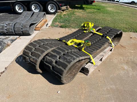 One lot of 2 sets of skid steer tracks