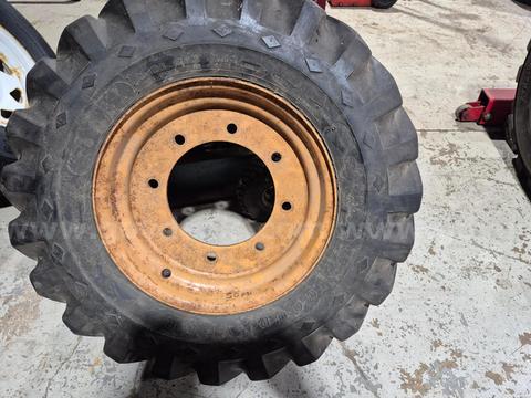 1 Case backhoe front wheel & tire assembly