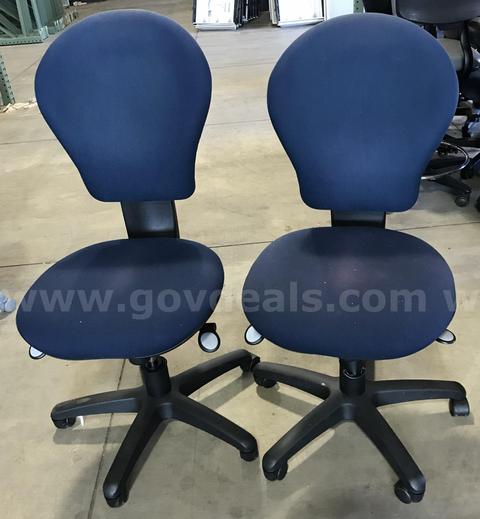 2 used dark blue rolling chairs. (S2)