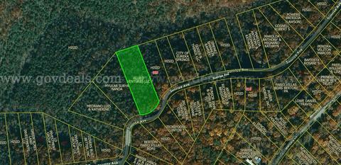 Steep Slope, Big Views. Finance this 1.44 acre Lot in Holiday Island