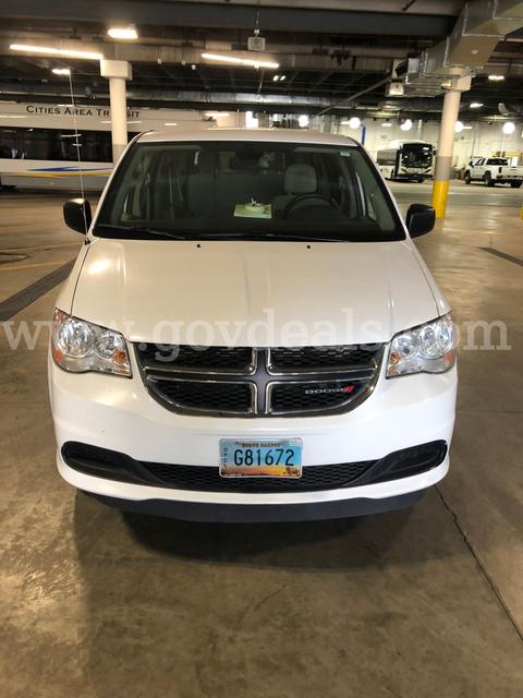 2019 Dodge Entervan, Wheelchair accessible with a manual pull out ramp. In Fair condition.