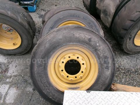 8 CATERPILLAR RIMS AND TIRES
