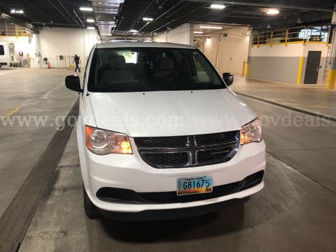 2019 White Dodge Caravan(Entervan), Wheelchair accessible with a manual pull out ramp. In Good condition.