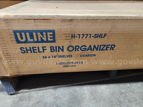 Box of new Uline metal shelves (Lot #4)