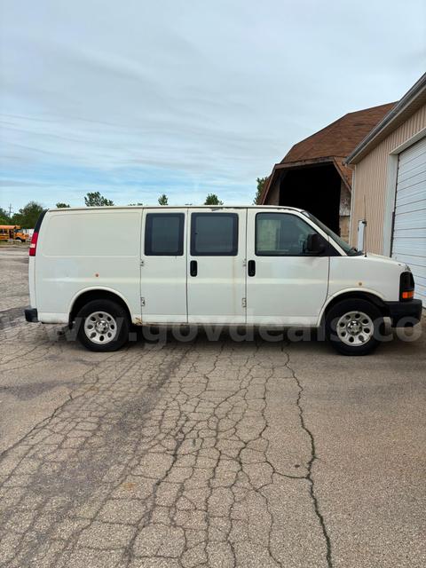 White 2012 Chevrolet Express cargo van (1500 cargo)
