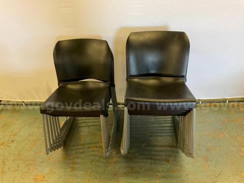 15 - Belnick Black RUT-238A-BK-GG Plastic / Metal Stackable Chairs