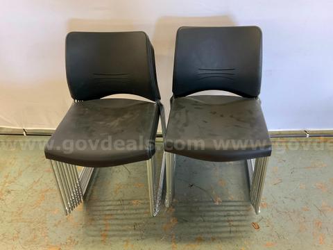 16 - Arcadia Black Plastic / Metal Stackable Chairs