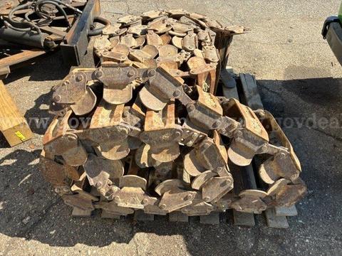 Metal over the tire tracks for skid steer loader.