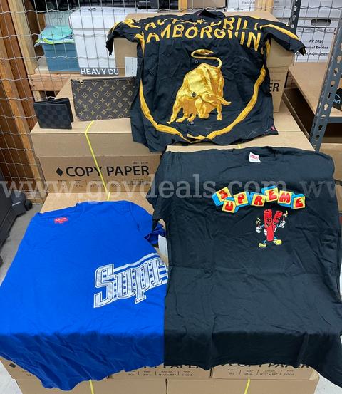 Seized - Three (3) Shirts, One (1) Clutch & One (1) Wallet