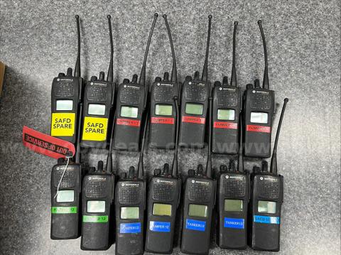 Lot of 14 Motorola XTS 1500 radios, lot includes remote mics, spare antennas, chargers, batteries