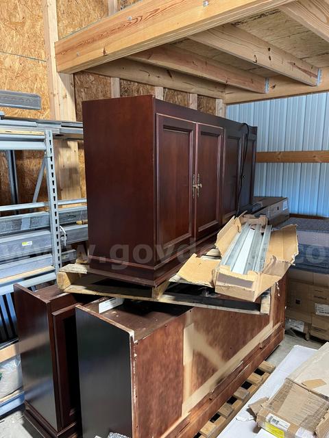 Three overhead wood cabinets