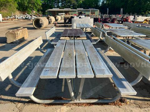 Picnic tables: the frames are steel and the table tops and seats are aluminum.