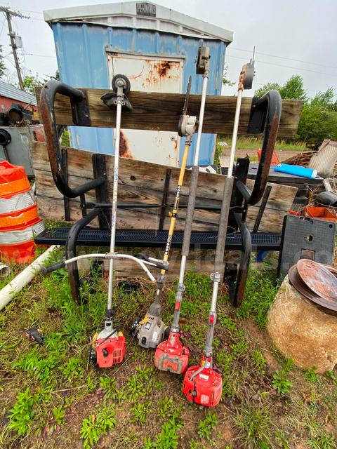 Lot of 1 Weed eater & 3 Pole Saws