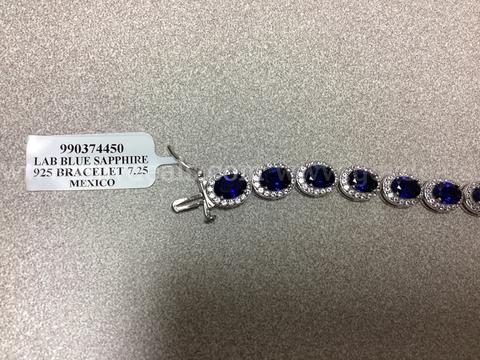925 Sterling Silver Bracelet Featuring a Lab Created Blue Sapphire 7.25
