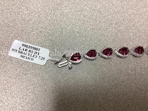 925 Sterling Silver Bracelet Featuring Lab Created Rubies  7.25 inches in length