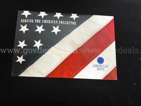 The American Mint Collection – Two (2) Gold‑Tone Commemorative Coins