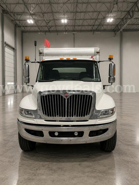 2015 International 4400 Lube Truck service body truck paired with a mobile lube setup