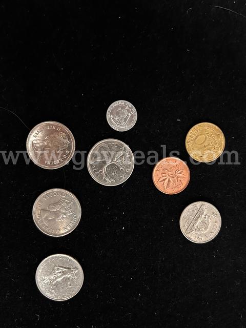 EIGHT FOREIGN COINS & FOUR US DOLLAR COINS (2) 1926 PEACE DOLLARS, (1) 1928 PEACE DOLLAR, (1) 1979