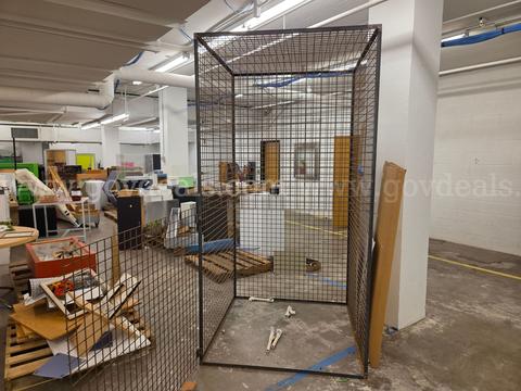 Large Freestanding Steel Wire-Mesh Equipment Safety Cage with Warning Sign