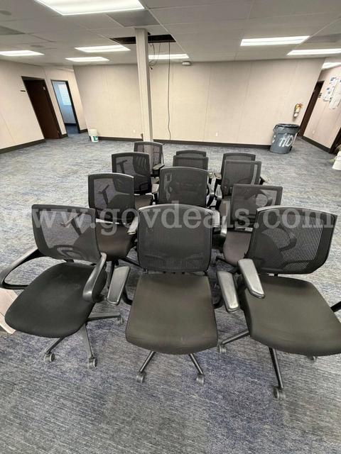 12 ea Office Chairs available.  Mesh Back, Padded Seat, Used Condition