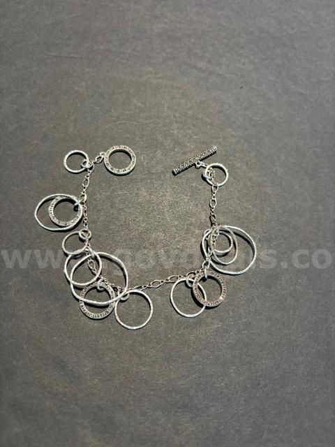 Beautiful 7" Toggle Bracelet. Looks like silver. No Magnetism. No stamp.