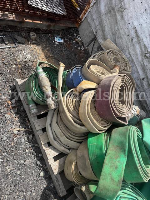 Large lot of assorted industrial/fire hoses with aluminum couplings and fittings
