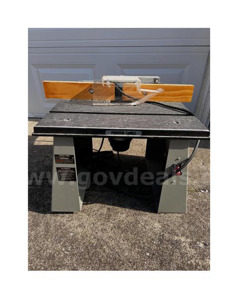 Porter Cable Table Model#698 with Porter Cable Fixed Base Router attached Model 1001.