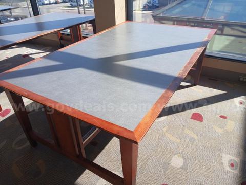 Wooden Table with Laminate Top.
