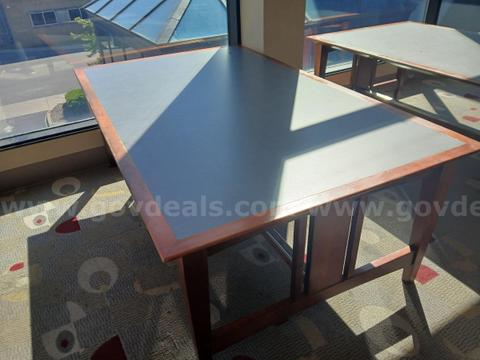 Wooden Table with Laminate Top.