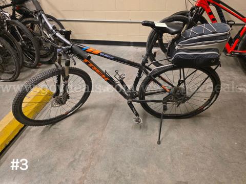 Used black Trek Xcaliber8 bike. Bike has flat tires.