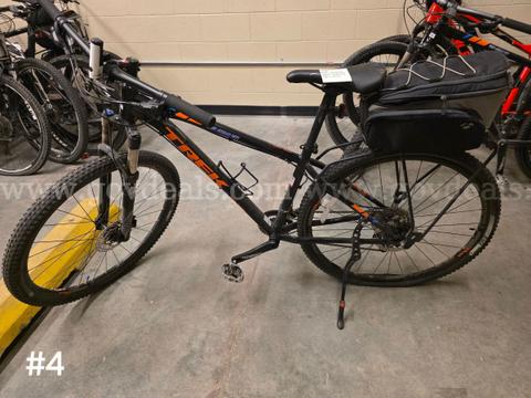 Used black Trek Xcaliber8 bike. Bike tires are flat.