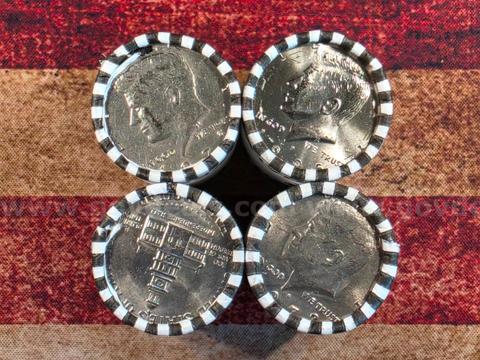4 Rolls of Kennedy Half Dollars Unopened