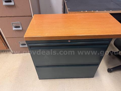 Lateral filing cabinet with attachable desk return wing