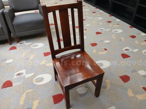 Lot of (4) Wooden chairs. From a library setting