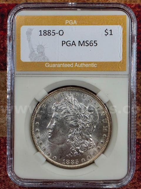 Stunning 1885-O Morgan Silver Dollar PGA Graded MS 65