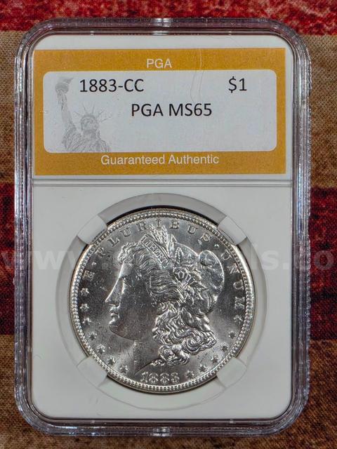 Stunning 1883-CC Morgan Silver Dollar PGA Graded MS 65